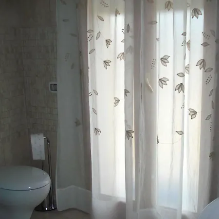 Casa Lisa A Porto Frailis בית נופש ארבאטקס